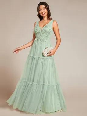 Robe de soirée en tulle transparent sans manches avec appliques